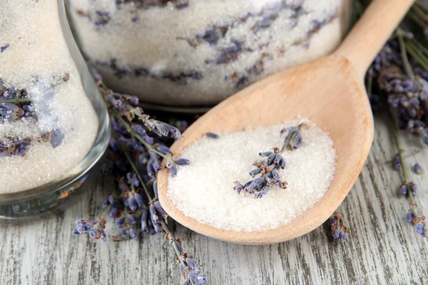 Jar of lavender sugar and fresh lavender flowers on wooden background — Stock Photo, Image