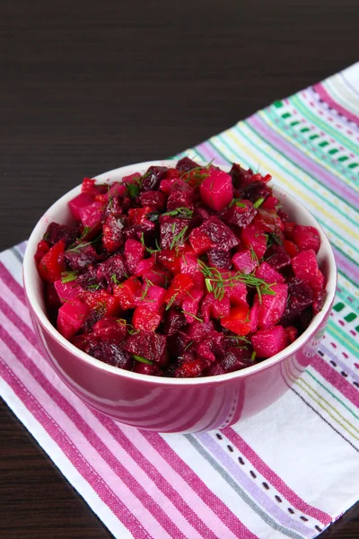 Beet salad in bowl on table close-up — Stock Photo, Image