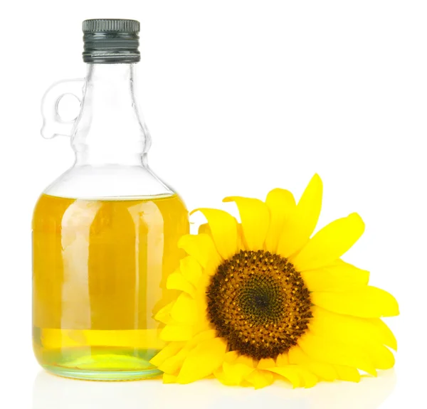 Oil in jar and sunflower isolated on white — Stock Photo, Image