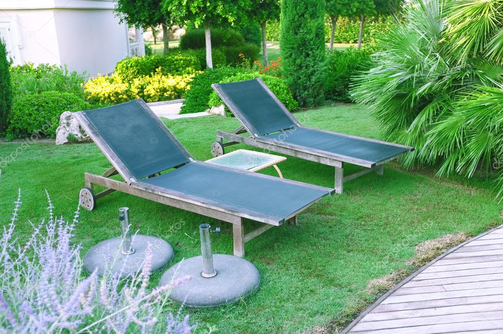 Lounge sunbed in hotel — Stock Photo © belchonock 28026629