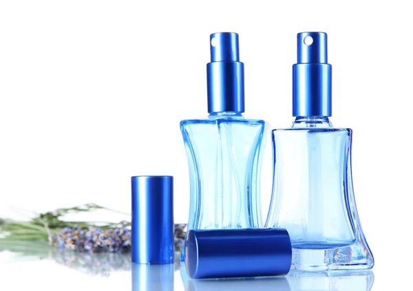 Perfume en botellas y lavanda aislado en blanco —  Fotos de Stock