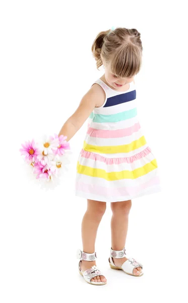 Little cute girl holding flowers, isolated on white — Stock Photo, Image