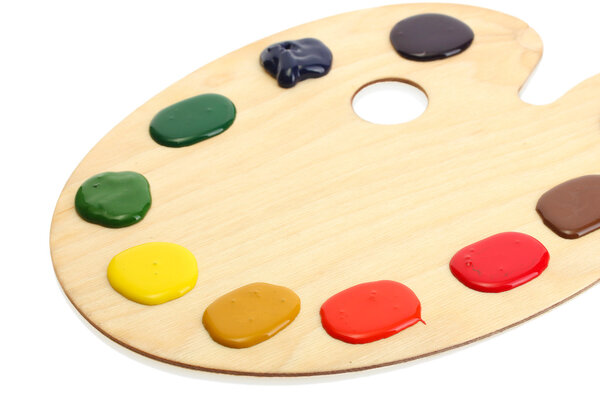 wooden art palette with paint isolated on white