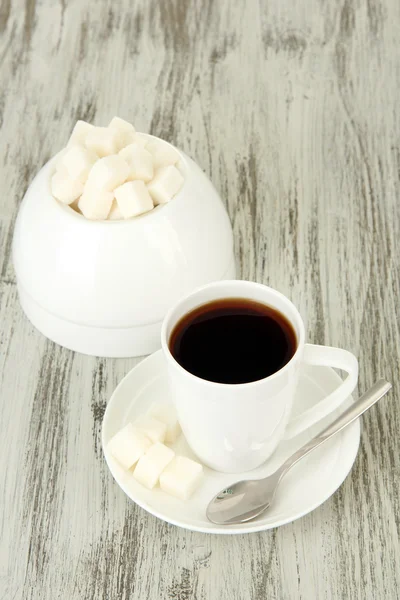 Xícara de café, na cor de fundo de madeira — Fotografia de Stock