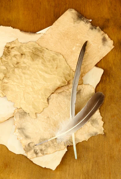 Old papers on wooden background — Stock Photo, Image