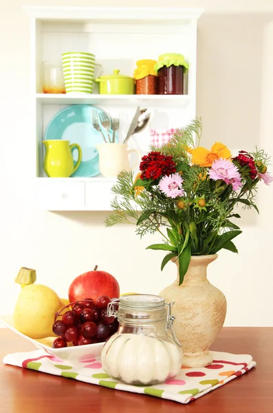 Kitchen composition on table on shelf background — Stock Photo, Image