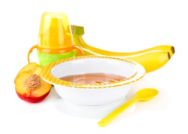 lezzetli bebek meyve püresi ve üzerinde beyaz izole biberon