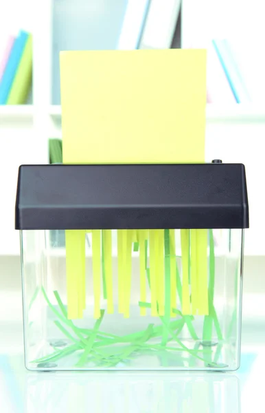 Paper shredder machine, on office interior background — Stock Photo, Image