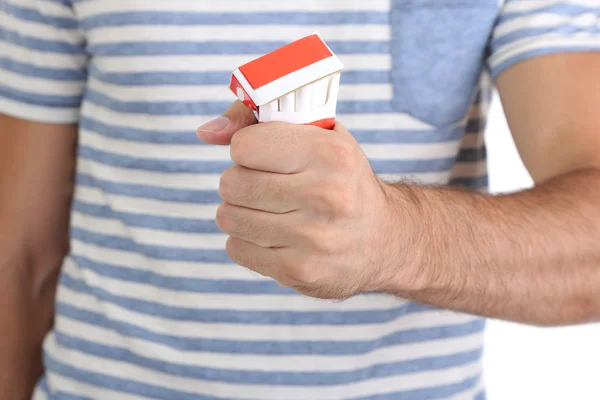 Man with crushed pack of cigarettes, close up — Stock Photo, Image