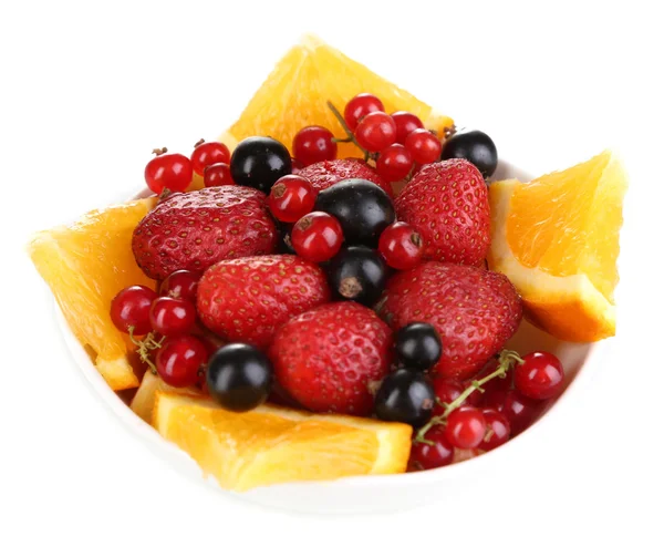 Useful fruit salad of fresh fruits and berries in bowl isolated on white — Stock Photo, Image