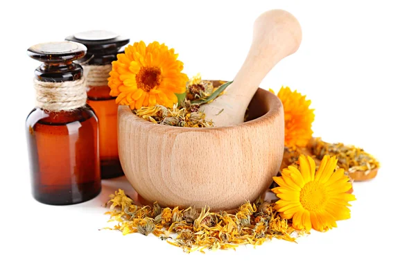 Medicine bottles and calendula flowers in wooden mortar isolated on white — Stock Photo, Image