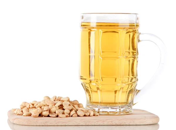 Beer in glass and nuts on on board isolated on white — Stock Photo, Image