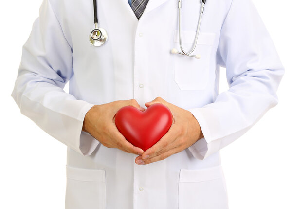 Medical doctor holding heart isolated on white