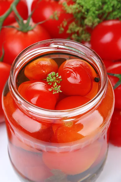 Open glass jar of tasty canned tomatoes, close up — Stock Photo, Image