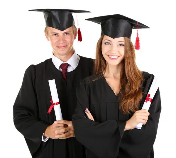 Dois estudantes graduados felizes isolados em branco — Fotografia de Stock