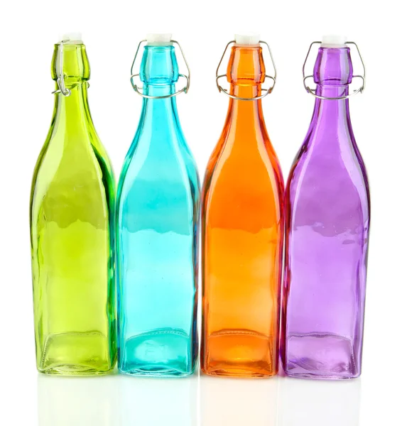 Empty color glass bottles, isolated on white — Stock Photo, Image