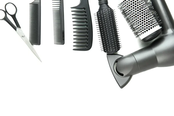Tara fırçalar, saç kurutma makinesi ve üzerinde beyaz izole kesme makası — Stok fotoğraf