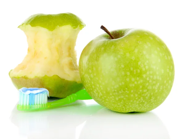 Apples with a toothbrush isolated on white — Stock Photo, Image