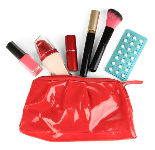 Hormonal pills in women's make-up bag isolated on white — Stock Photo, Image