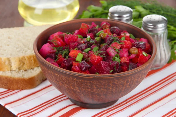 Beet salad in bowl on table close-up — Stock Photo, Image