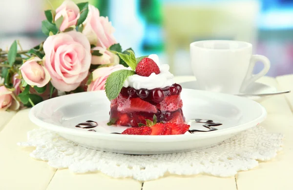 Tasty jelly dessert with fresh berries, on bright background — Stock Photo, Image