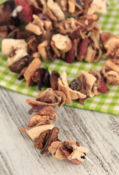 Dried mushrooms on wooden background — Stock Photo, Image