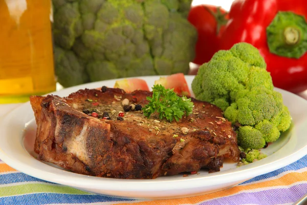 Piece of fried meat on plate isolated on white — Stock Photo, Image