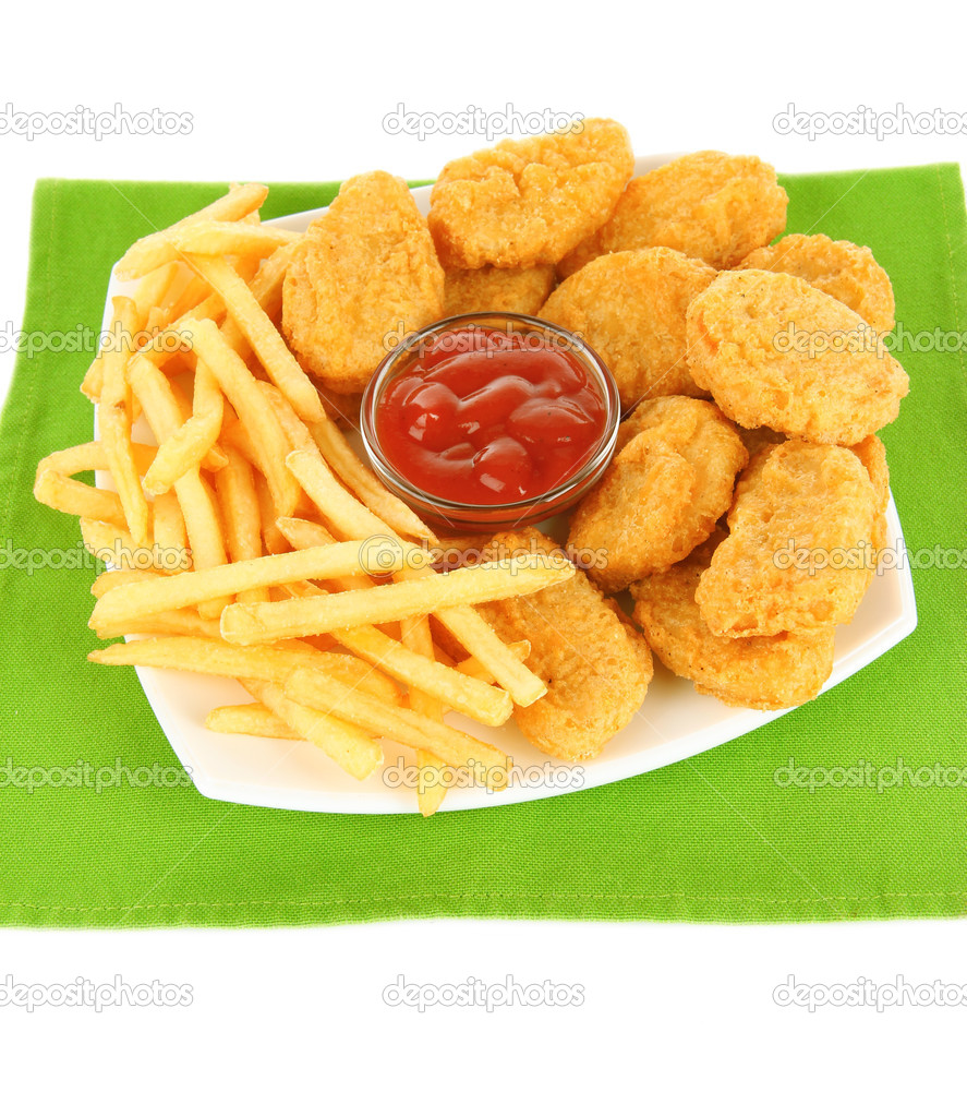 Fried chicken nuggets with french fries and sauce isolated on white