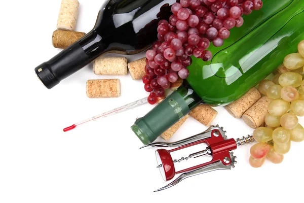 Bottles of wine, grapes and corks, isolated on white — Stock Photo, Image