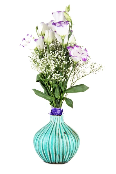 Bouquet of eustoma flowers in vase, isolated on white — Stock Photo, Image