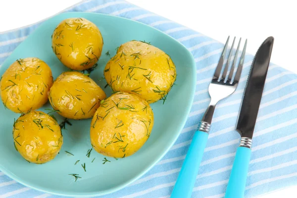 Boiled potatoes on platen on napkin isolated on white — Stock Photo, Image