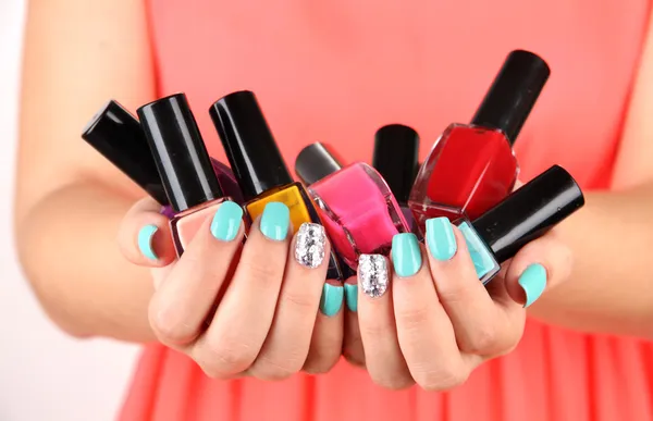 Woman hands with nail polishes, close-up — Stock Photo, Image