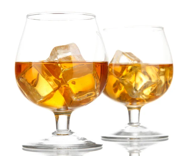 Brandy glasses with ice isolated on white — Stock Photo, Image