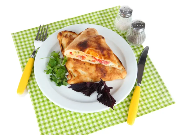 Pizza calzone on table on napkin isolated on white — Stock Photo, Image