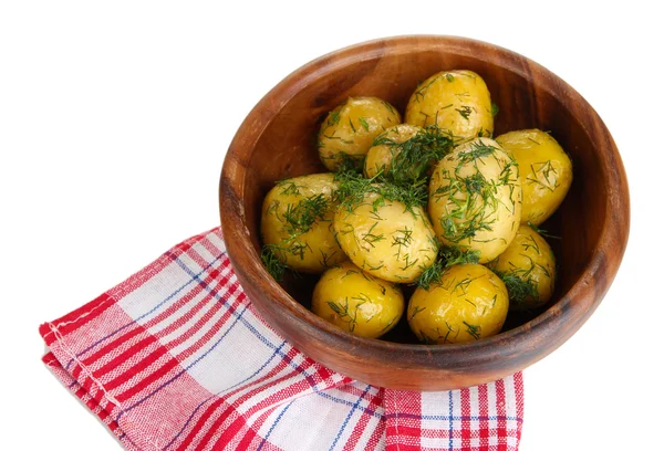 Boiled potatoes on wooden bowl on napkins isolated on white — Stock Photo, Image