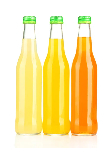 Bottles with tasty drink, isolated on white — Stock Photo, Image