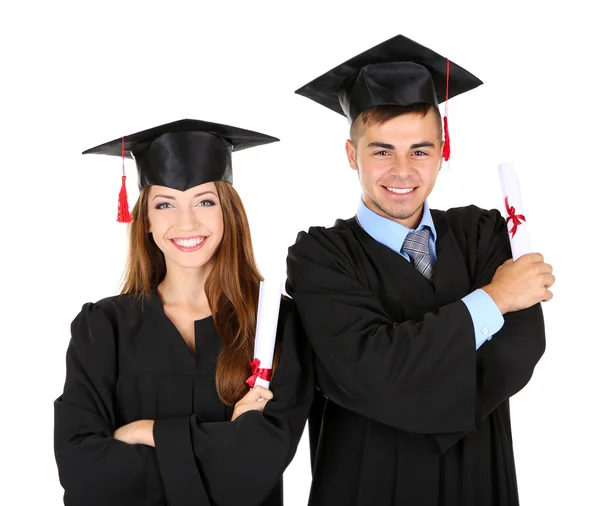 Due felici studenti laureati isolati su bianco — Foto Stock