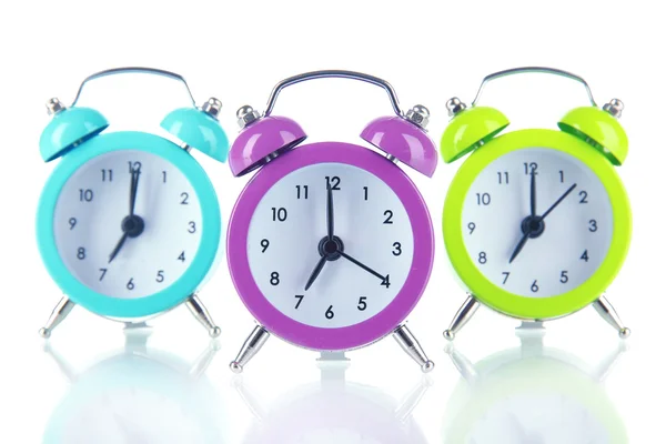 Reloj despertador colorido aislado en blanco — Foto de Stock