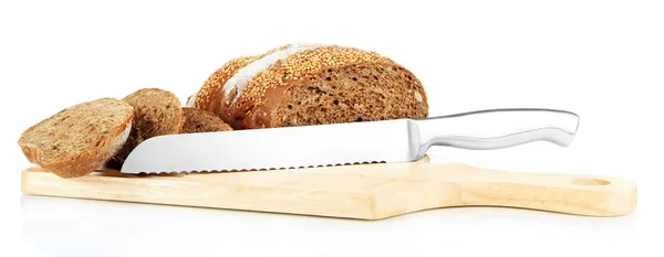 Bread with sesame seeds and knife on wooden board isolated on white — Stock Photo, Image