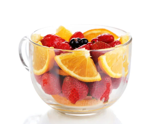 Useful fruit salad in glass cup isolated on white — Stock Photo, Image