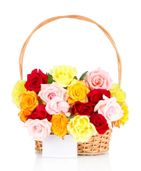 Beautiful bouquet of roses in wicker basket isolated on white — Stock Photo, Image