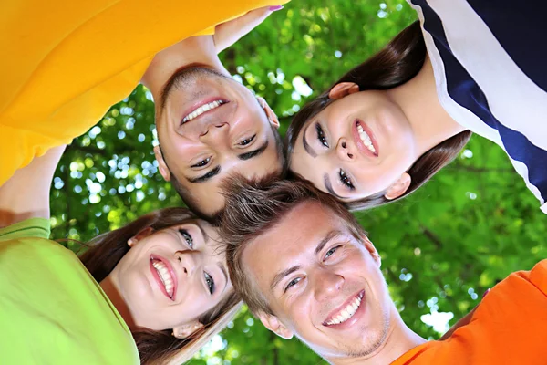 Happy group of young people in park — Stock Photo, Image