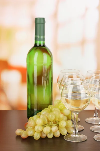 White wine in glass and bottle on room background — Stock Photo, Image