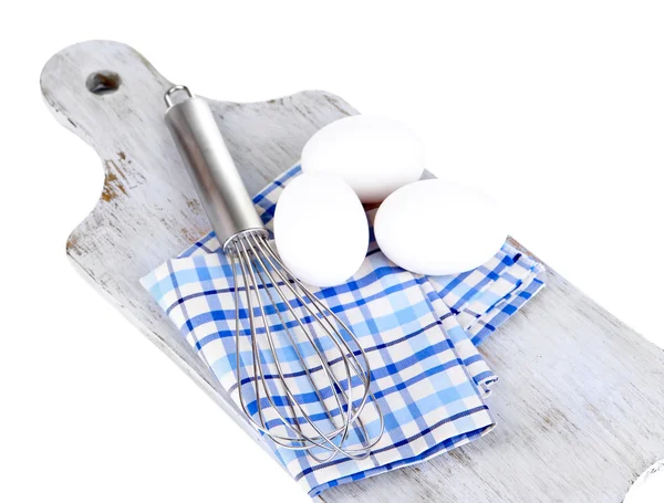 Corolla i jaj na desce na białym tle — Zdjęcie stockowe