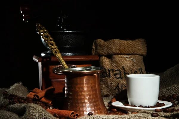 Metal turk and coffee cup on dark background — Stock Photo, Image