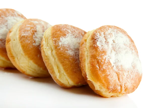 Смачні пончики, ізольовані на білому — стокове фото