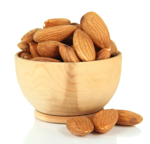 Almond in wooden bowl, isolated on white — Stock Photo, Image