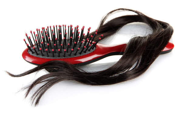 comb brush with hair, isolated on white