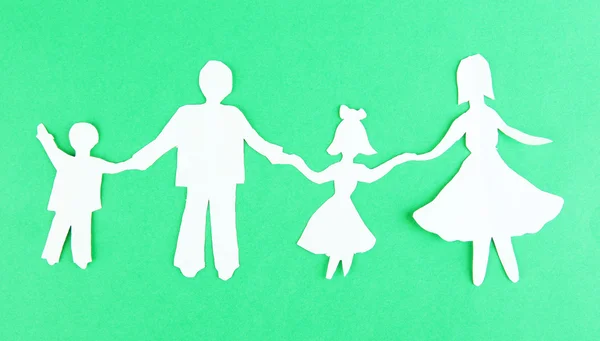 Paper people on color background — Stock Photo, Image