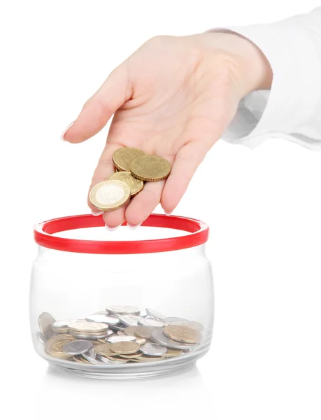 Woman hands with coins in glass jar isolated on white — Stock Photo, Image